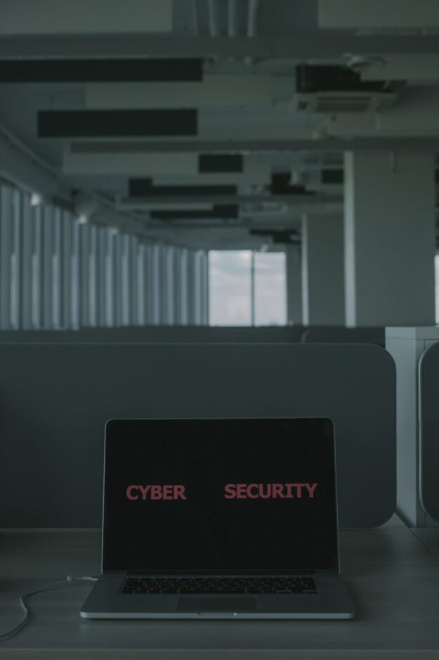 Free Laptop With Cyber Security Text on the Screen Stock Photo