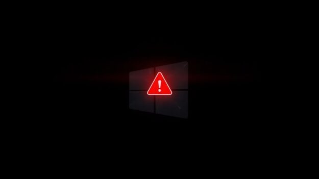 Broken Windows 10 logo with a red alert symbol.
