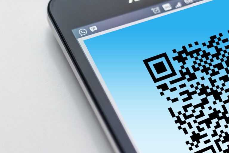 pexels-pixabay-278430-scaled.jpg Free High-resolution close-up of a smartphone displaying a QR code on its screen. Stock Photo